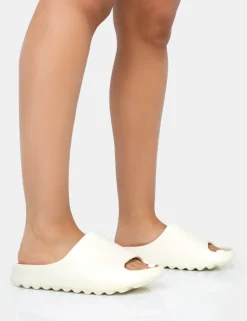 Cheap Brady Cream Rubber Flat Slider Sandals Back In Stock | Flats