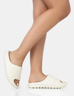 Cheap Brady Cream Rubber Flat Slider Sandals Back In Stock | Flats