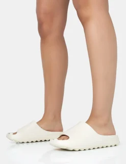 Cheap Brady Cream Rubber Flat Slider Sandals Back In Stock | Flats