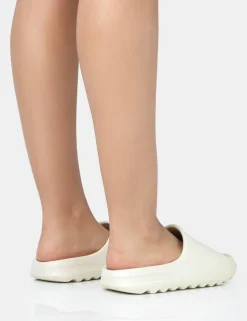 Cheap Brady Cream Rubber Flat Slider Sandals Back In Stock | Flats