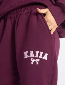 Shop Kaiia Bow Embroidered Ribbed Waistband Wide Leg Joggers Plum & Baby Pink Sculpt & Leisure | Kaiia The Label
